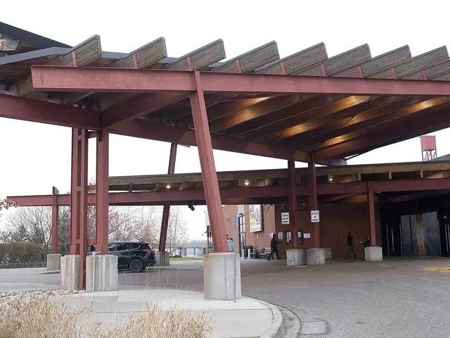Casino Ajax: the timber-and-steel entrance canopy over the drop-off loop.